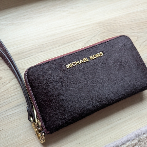 Michael Kors Handbags - NWOT Michael Kors Burgundy Wristlet Wallet
